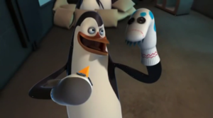 Kowalski with a sock puppet.
