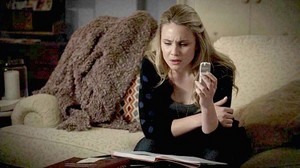  The Originals 1x09—Camille O’Connell reads books on vampire lore.