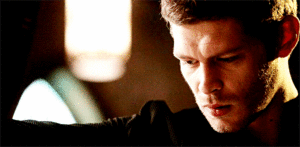  Klaus looking at the baby
