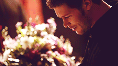  Klaus looking at the baby