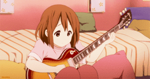  Yui playing her guitar!