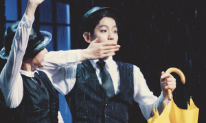  Baekhyun bernyanyi In The Rain