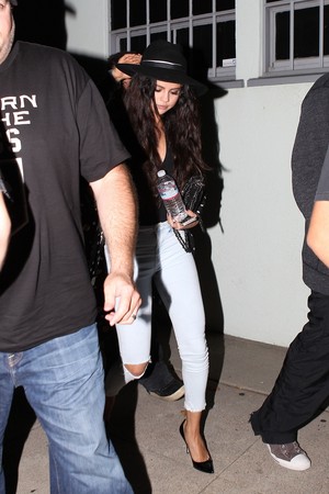 Selena leaving after a brief visit to a recording studio (June 23)