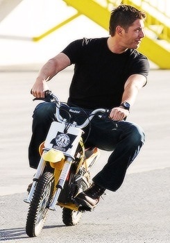  Jensen Riding a Small Motorcycle