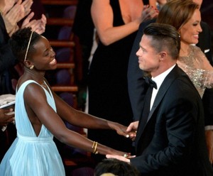  Lupita Nyong'o and Brad Pitt Oscars