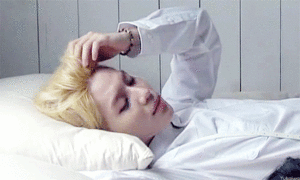 TAEMIN ON THE BED GIF 