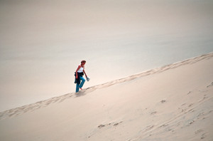  Woman Climbing Dune
