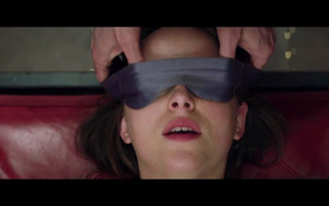 Christian blindfolding Ana