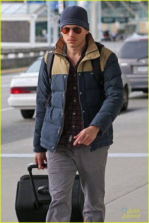  at the airport on Wednesday (January 21) in Vancouver, Canada.