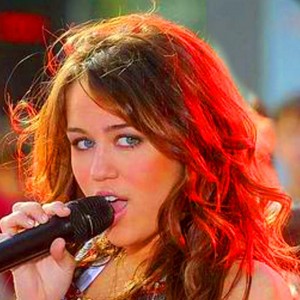 Miley Cyrus singing a song