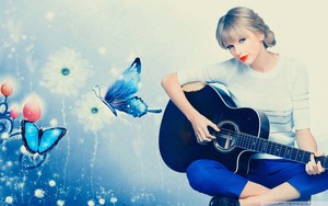 Taylor with guitar