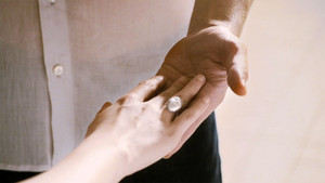  Edward and Bella touching hands
