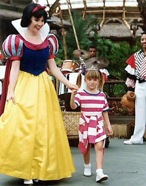  Michelle being escorted door Snow White