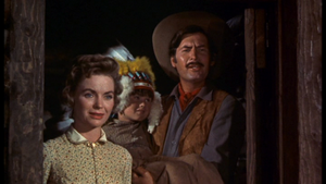  Dorothy McGuire as Katie, Kevin Corcoran as Arliss, and Fess Parker as Jim Coates in Old Yeller