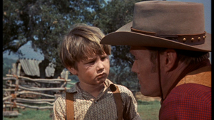 Kevin Corcoran as Arliss Coates and Chuck Connors as Burn Sanderson in Old Yeller