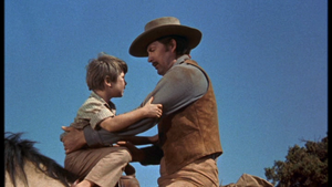  Kevin Corcoran as Arliss and Fess Parker as Jim Coates in Old Yeller
