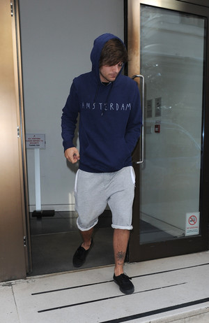  Louis leaving Sony muziki offices in London