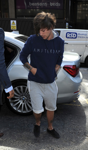 Louis leaving Sony Music offices in London