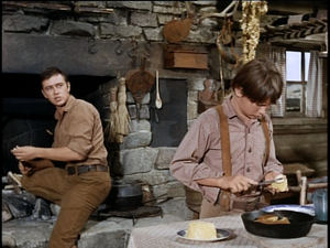  Tommy Kirk as Travis Coates and Kevin Corcoran as Arliss Coates in Savage Sam