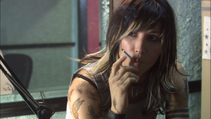 Gina Gershon as Jacki in 'Prey for Rock and Roll'