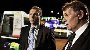  Jai Courtney as Detective Jim Melic with Tom Wilkinson in Felony