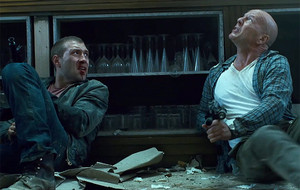  Jai Courtney as Jack McClane and Bruce Willis as John McClane in A Good 日 to Die Hard