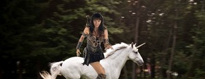  Xena riding an beautiful unicorn
