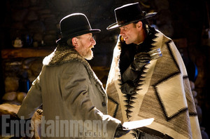  Walton Goggins as Sheriff Chris Mannix and Tim Roth as Oswaldo Mobray in The Hateful Eight