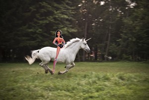  Wonder Woman rides on her Beautiful Unicorn