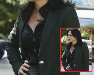 Regina's shirt buttons