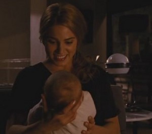 Rosalie "adoring" expression while holding her niece