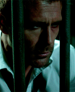 John behind bars