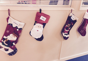  The Arrow Production Office hanging up Team Arrow stockings for Christmas