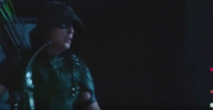 Malcolm as Green Arrow