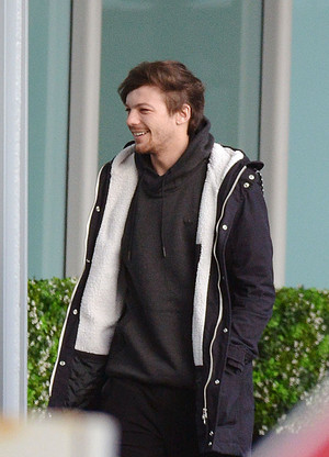  Louis at the Airport in London