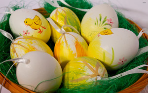 decorative easter eggs in a basket 