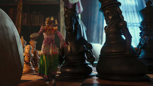 Alice Through The Looking Glass - Alice in the big chess table