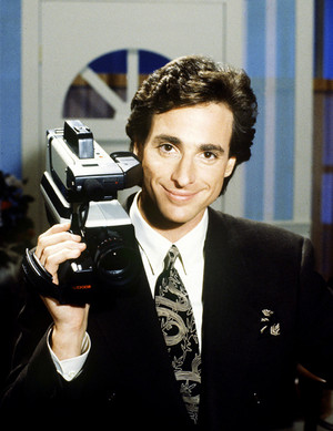 Bob Saget in a promo photo for America's Funniest Home Videos