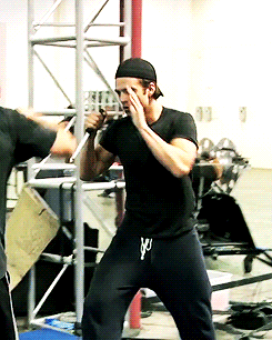  Seb practicing fighting on set