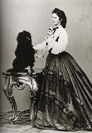  Empress Elizabeth in 1864 playing with a dog