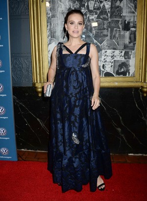 Attending the 21st Annual Huading Global Film Awards at The Theatre at Ace Hotel in Los Angeles (Dec
