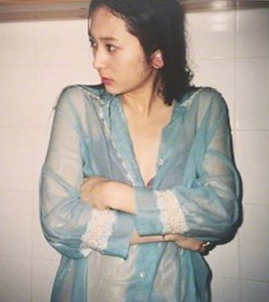 Krystal takes a bath in foto for her art collaboration exhibit
