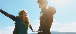  Kara (Supergirl) hugs Barry (The Flash)