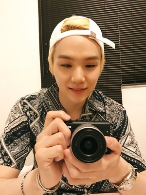  Min yoongi with a camera