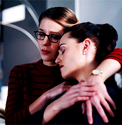  Lena holding Kara's hand