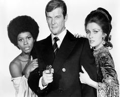 Roger Moore And His Two LALD Co-Stars