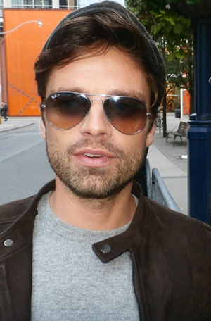  Sebastian Stan with hat and sun glasses