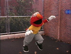  Elmo Playing Handball (Elmo's World)