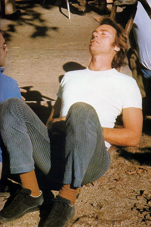  Clint Eastwood catches some sun during a break in the directing of Breezy 1973