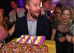 Stephen Amell, Emily Bett Rickards, and friends celebrating his birthday early.